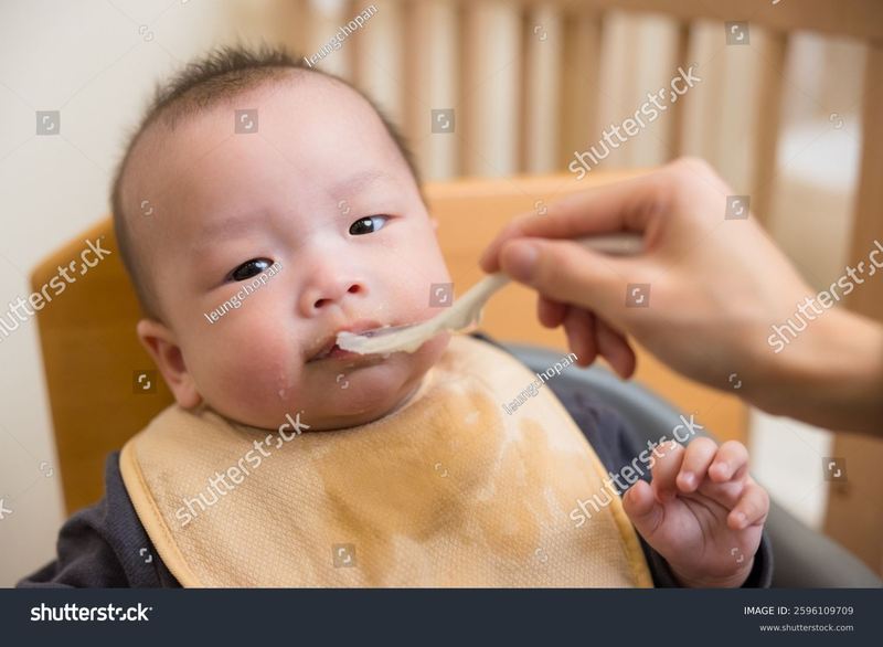 Starting Solids: When to Reduce Formula